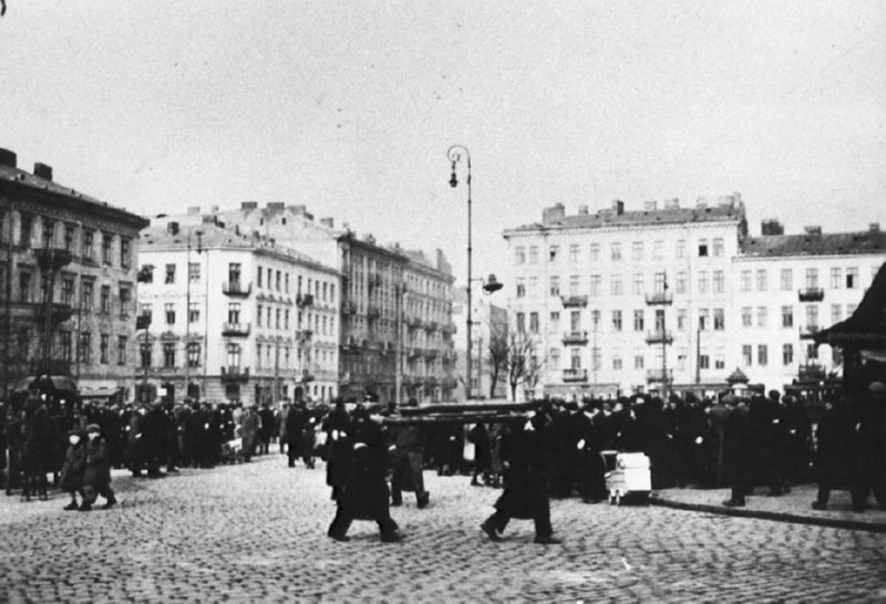 Jews gather at a public square in the ghetto